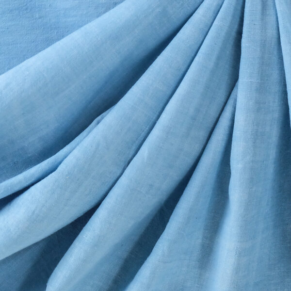Image of sky blue organic handspun cotton fabric draped