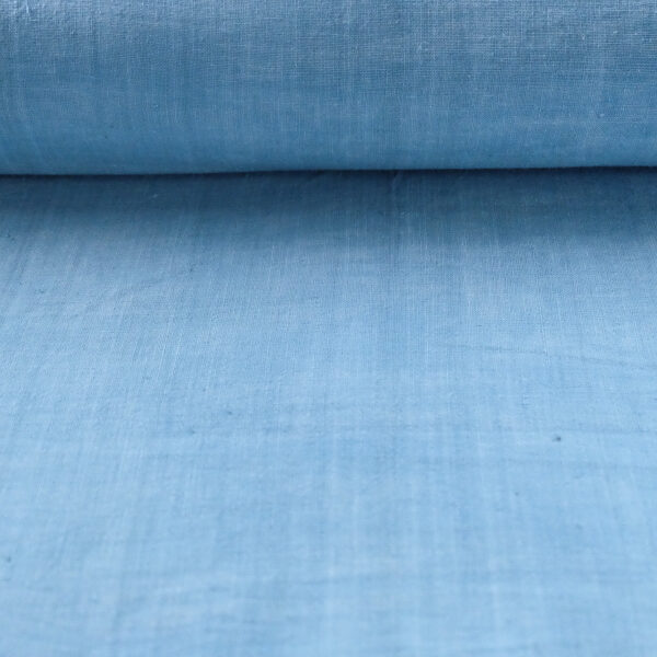 flat roll image of sky blue 11.11 handspun organic cotton fabric