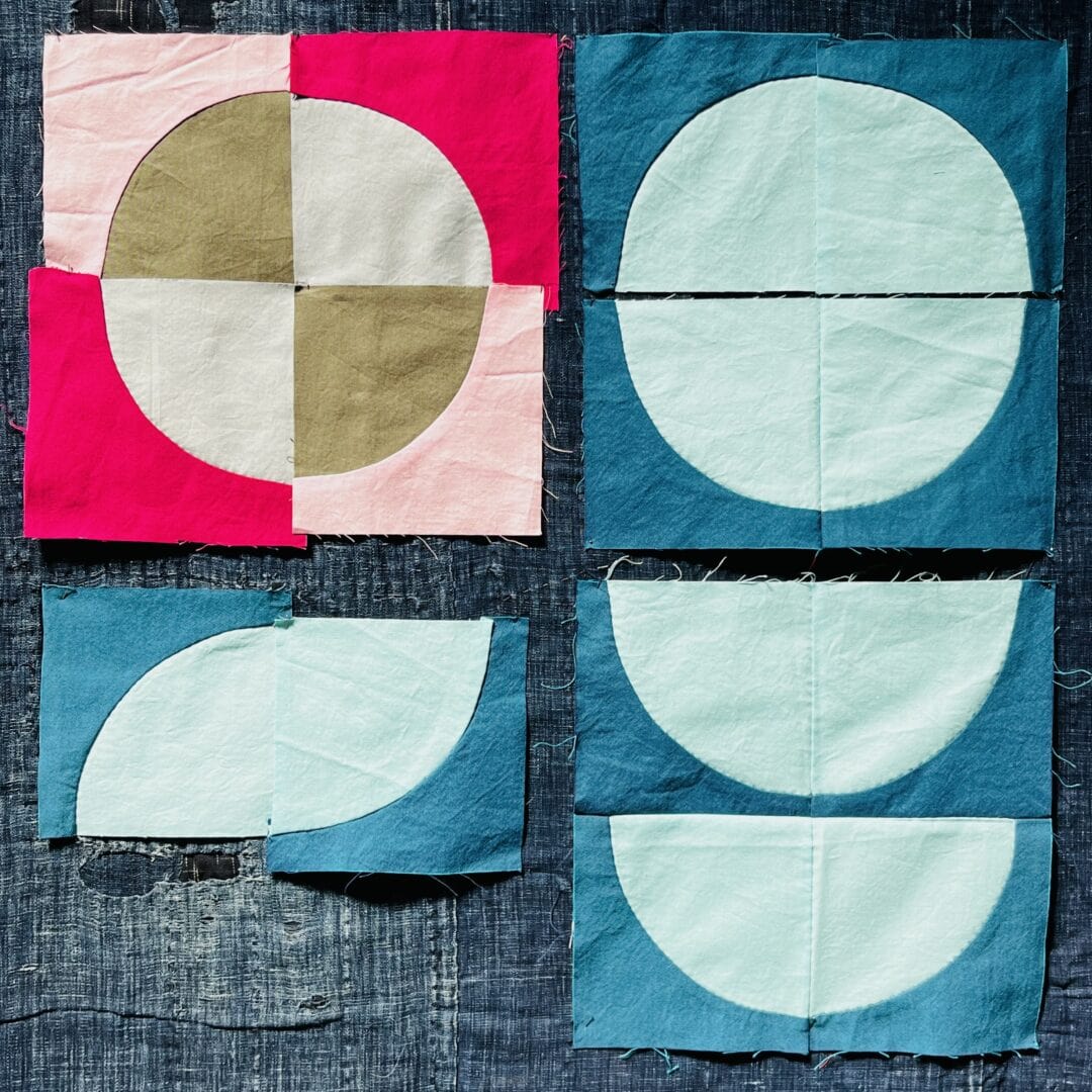 Colorful fabric scraps sewn into semicircles.