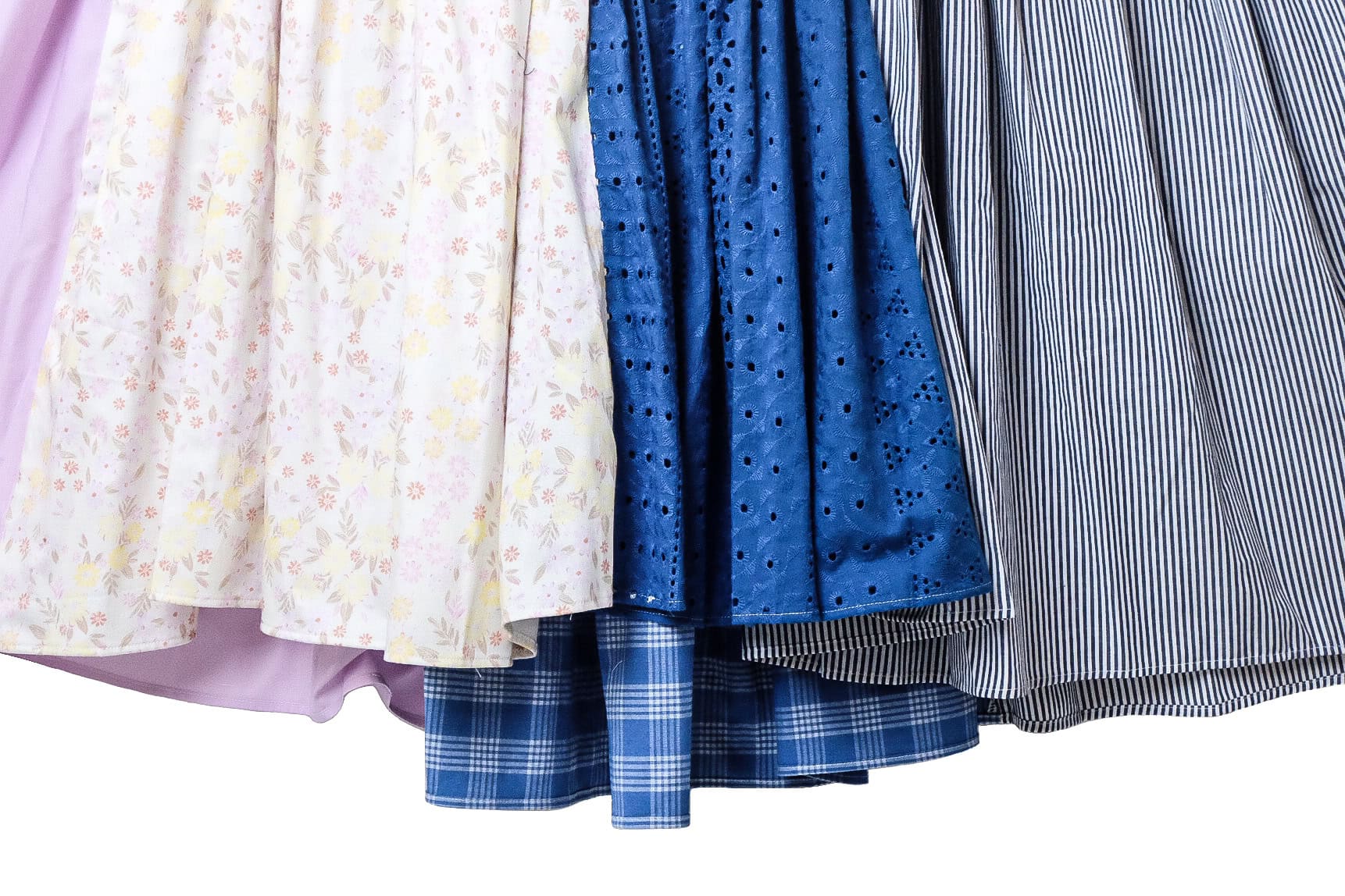 Four skirts in different patterns and colors.