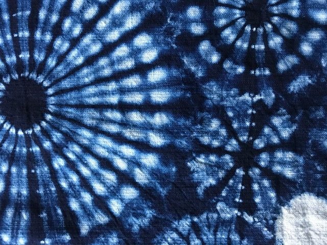 Blue and white tie dye fabric.