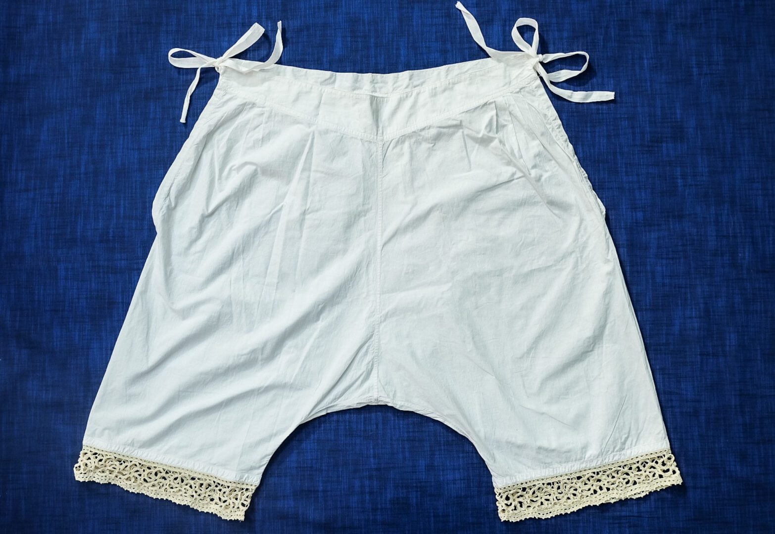 White cotton bloomers with lace trim.