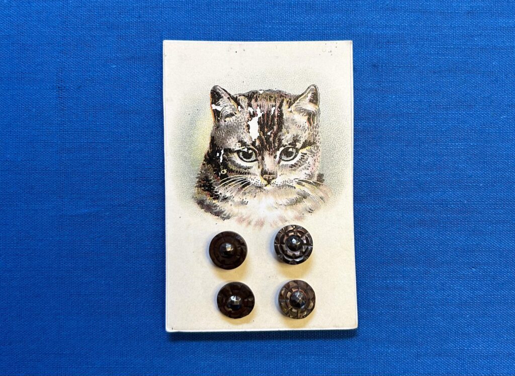 Textile Idiom Series “Cute as a Button” Tatter