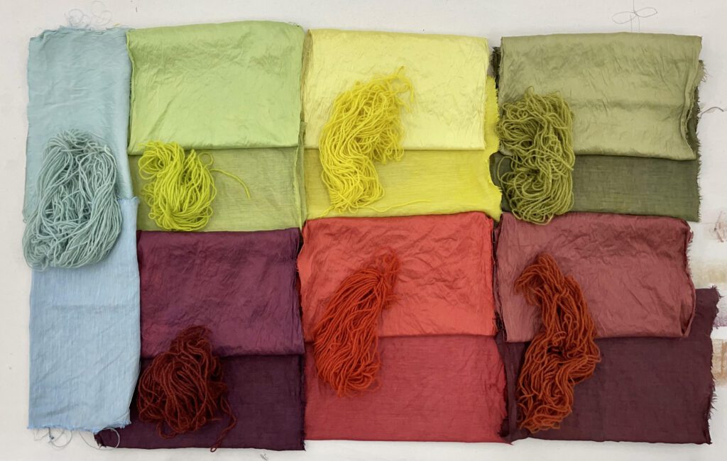 Natural dye samples with matching yarn.