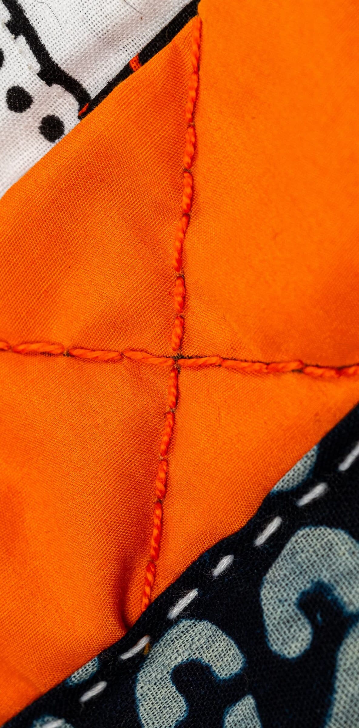Detail shot of orange stitching.